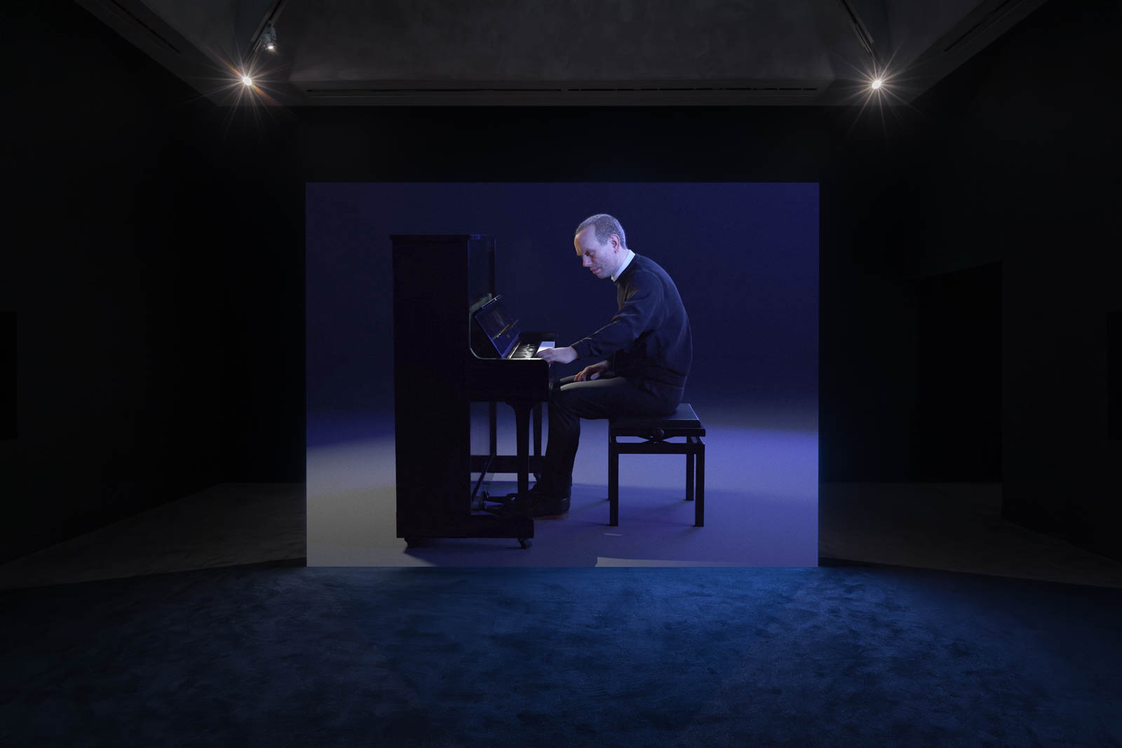 Ed Atkins, Pianowork 2, 2023, video projection with sound, installation view Tate Britain